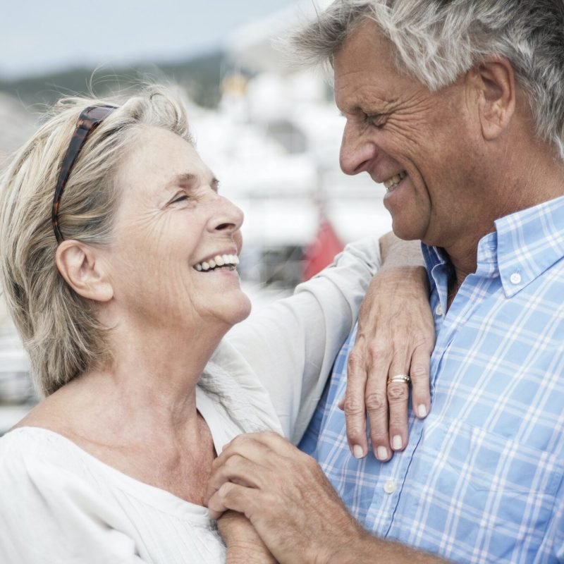 Spain, Senior couple at harbour